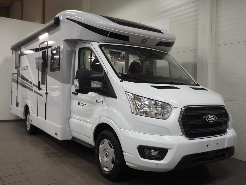 Bild 1 av Caravans International Campervan Ford Ci Magis 87 XT DEMOUTFÖRSÄLJNING I Face to Face I AUT I Långbäddar