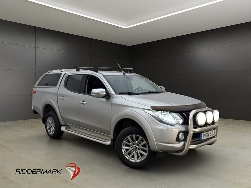 Bild 1 av Mitsubishi L200 Dubbelhytt 2.4 4WD Värm Drag Diff Skinn Kåpa Moms 1-Äga