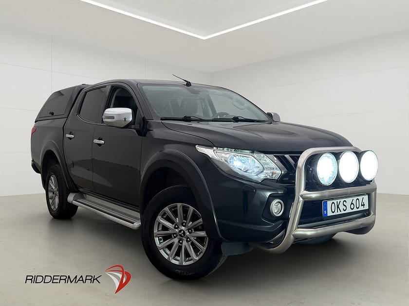 Bild 1 av Mitsubishi L200 Dubbelhytt Premium 2.4 4WD Värmare Drag Diff Skinn Kåpa