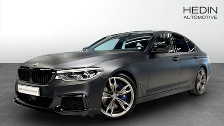 BMW M550i xDrive Sedan B&W Drag